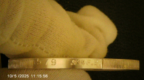 Silver-Round-With-An-Apollo-16-Motif--Design.
